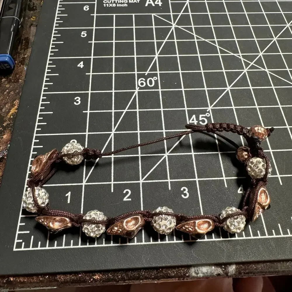 Rose Gold Tone Skull Bracelet with Crystal Rhinestone Beads and Adjustable Cord